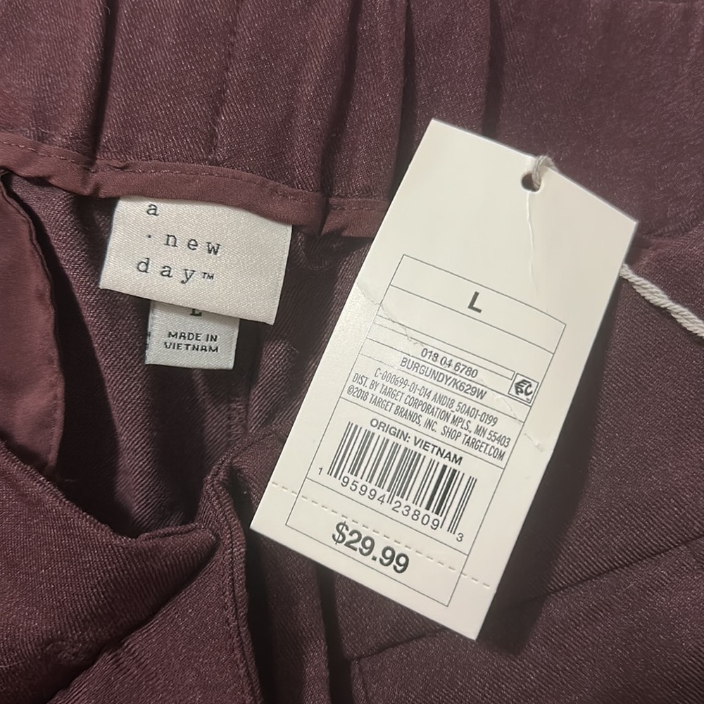 Wide leg maroon trousers. Size large.